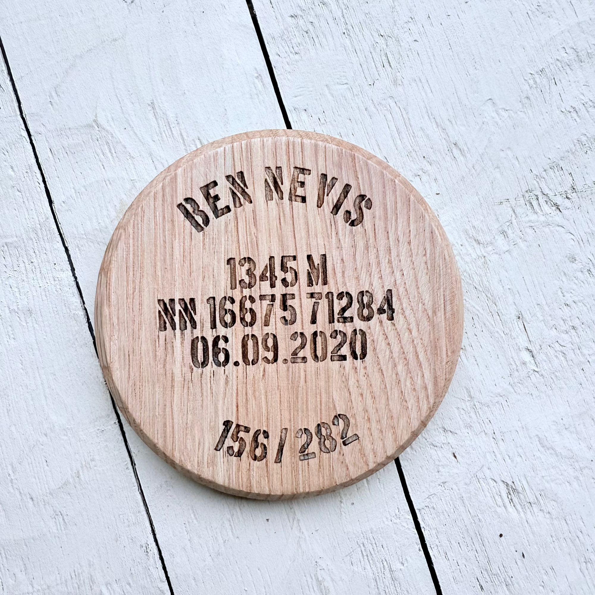 Wooden Barrel oak Coaster with engraved names, coordinates, elevations of munros. 